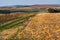 Rolling landscape with plowed field and hills near Bohate Malkovice