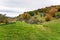 Rolling rural landscape in Vermont on an overcast autumn day