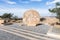 Rolling stone used as fortified door of a Byzantine monastery in Memorial Church of Moses on Mount Nebo near the city of Madaba in