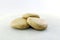 Rolling wheat flour dough into round dumplings to make puri