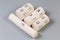 Rolls of the different woven elastic medical bandages with clips