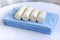 Rolls of elastic bandages lie on blue sheets