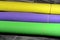 Rolls of glittered colorful Eva foam sheets, colored cardboard, rubber pad, sponge papers for school arts and crafts, pile of