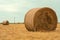 Rolls of hay, haystack bales in countryside landscape