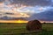 Rolls of haystack on fields at harvesting time