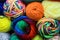 Rolls of Multi colored yarn in rows macro photograph