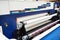 Rolls paper and fabric in plotter