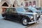 Rolls Royce black car in front of Badrutt palace, luxury hotel in Sankt Moritz, Switzerland