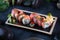 Rolls with smoked salmon, eel and tuna.Rolls Kaisen. Avocado inside rolls.Dark background.Vegetarian food. Traditional