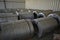 Rolls of steel sheet stored in warehouse; galvanized steel coil in the Duct Factory. Packed rolls of steel sheet, Cold rolled stee