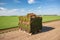 Rolls of turf stacked in preparation ready to be laid in ground Lawn