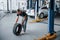 Rolls wheel. Mechanic holding a tire at the repair garage. Replacement of winter and summer tires