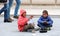 Roma boy singing and playing darbuka asking for money downtown of Skopje,capital of Macedonia