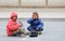 Roma boy singing and playing darbuka asking for money downtown of Skopje, capital of Macedonia