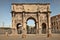 ROMA, ITALY, APRIL 7, 2016 : Arco de Constantino (Arch of Constantine) and Colosseum. The arch was erected by the Roman Senate to