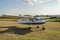 ROMA, ITALY - AUGUST 2018: An experienced pilot and a little girl child at the helm of a light-engine aircraft Tecnam P92 Echo