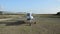 ROMA, ITALY - AUGUST 2018: The pilot on a light-engine aircraft Tecnam landed on a ground aerodrome and turns off the engine, stop