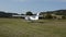 ROMA, ITALY - AUGUST 2018: A small light-engine aircraft Tecnam Echo landing on a dirt airport