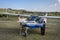 ROMA, ITALY - AUGUST 2018: Two adult pilots show their light-engine aircraft Tecnam Echo to a little girl