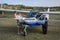 ROMA, ITALY - AUGUST 2018: Two adult pilots show their light-engine aircraft Tecnam Echo to a little girl