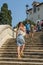 ROMA, ITALY - AUGUST 2018: Young beautiful girl on the stairs of Spain Square in Rome, Italy