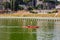 ROMA, ITALY - JULY 2017: The athlete paddles a kayak on a Parco Centrale del Lago in Rome, Italy