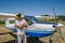 ROMA, ITALY - JULY 2017: Courageous young man pilot on a light aircraft Tecnam P92-S Echo