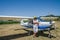 ROMA, ITALY - JULY 2017: Courageous young man pilot on a light aircraft Tecnam P92-S Echo