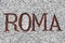 Roma Word Carved in Stone