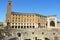 Roman amphitheater with palaces of the Sedile and the INA Istituto Nazionale delle Assicurazioni in Sant`Oronzo square in Lecce,