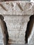 Roman antique limestone pillar with inscriptions on latin language
