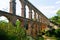 Roman aqueduct de les Ferreres in sunny day