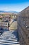 Roman aqueduct and market square in historic city Segovia