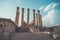 Roman architecture. old historic district of Jarash. High beautiful antique columns against the blue sky. Temple of Artemis in the