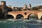 Roman bridge Ponte Pietra and church San Giorgio