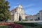 Roman Catholic Church of Visitants with flowers in green park of Warsaw in sunny summer day, Poland