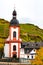 Roman Catholic Church in Zell, Germany. Picturesque village in famous Mosel wine region in the fall season. Autumn vineyards and