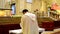 Roman Catholic priests taking communion during congregation mass