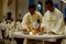 Roman Catholic priests taking communion during congregation mass