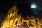 Roman Coliseum under a full moon