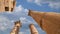 Roman Columns in the Jordanian city of Jerash Gerasa of Antiquity against the background of moving clouds