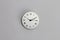 Roman number clock surface on grey background