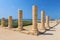 Roman old marbe column square in Caesarea Archaeological site in Israel.