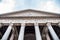 Roman Pantheon - detailed front bottom view of entrance with columns and tympanum. Rome, Italy