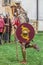 Roman soldier in battle costume shows specific footwear