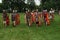 Roman soldiers stand at attention in a medieval reenactment