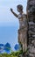 Roman statue above the Mediterranean sea on top of Monte Solaro