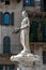 The roman statue called Madonna Verona above the fourteenth century fountain in Piazza delle Erbe, Verona