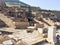 Roman stone pillars and terraced hosues ruins on road side in ephesus Archaeological site in turkey