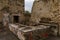 Roman toilets in the ancient city of Herculaneum near Napoli